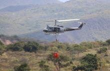 Emergencia en Alpujarra: incendio forestal consume 250 hectáreas, Fuerza Aérea Colombiana apoya extinción